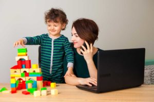 Executive Mom Child Playing Blocks