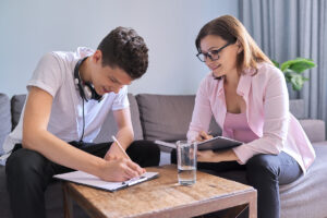 Speech Therapist and Patient working together