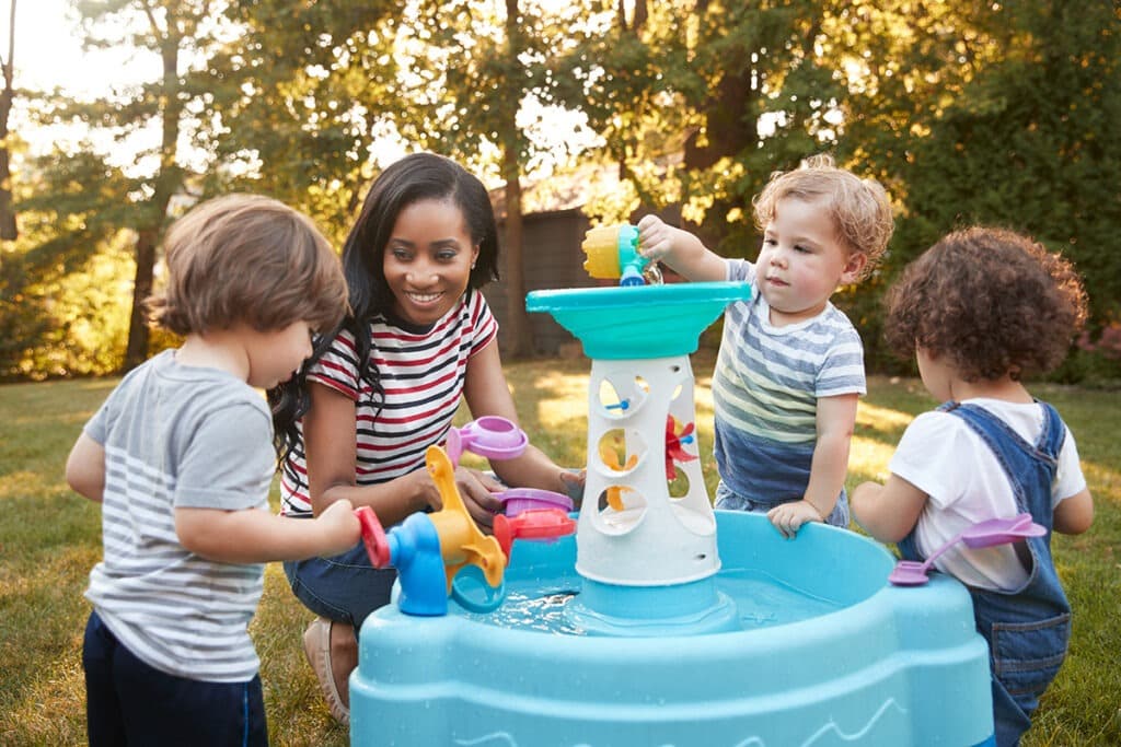 Kids Playing at Water Table