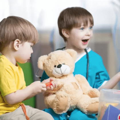 Kids Playing with Teddy Bear