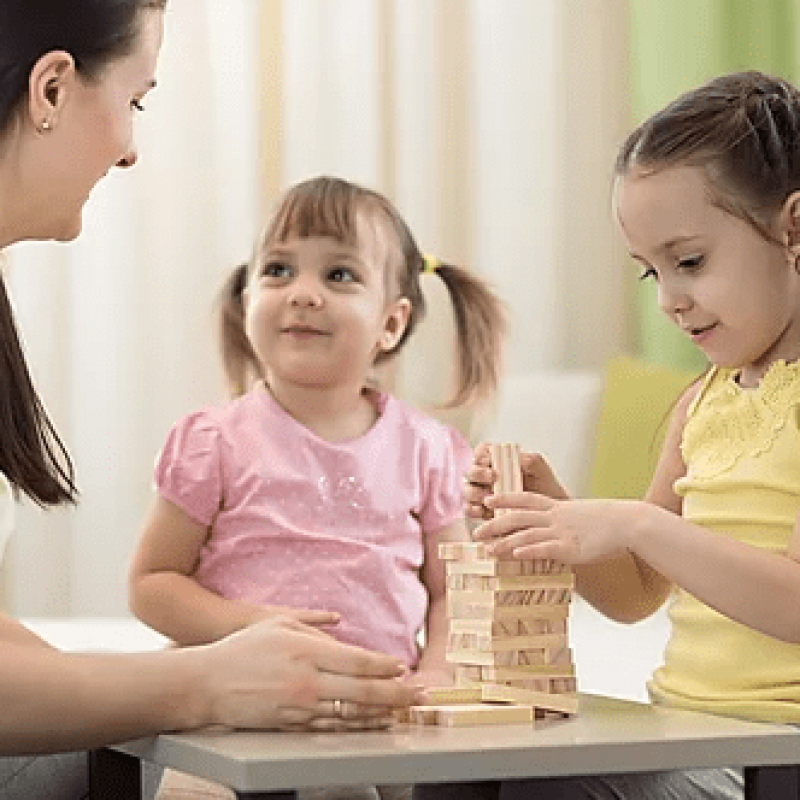 Children Playing Games with Therapist